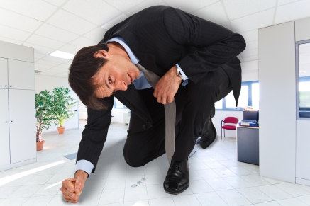 Portrait of businessman in a small office